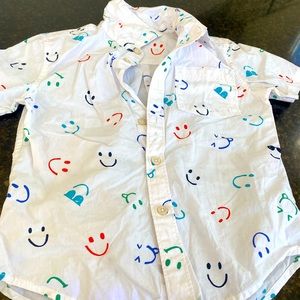White button up happy face boys dress shirt.